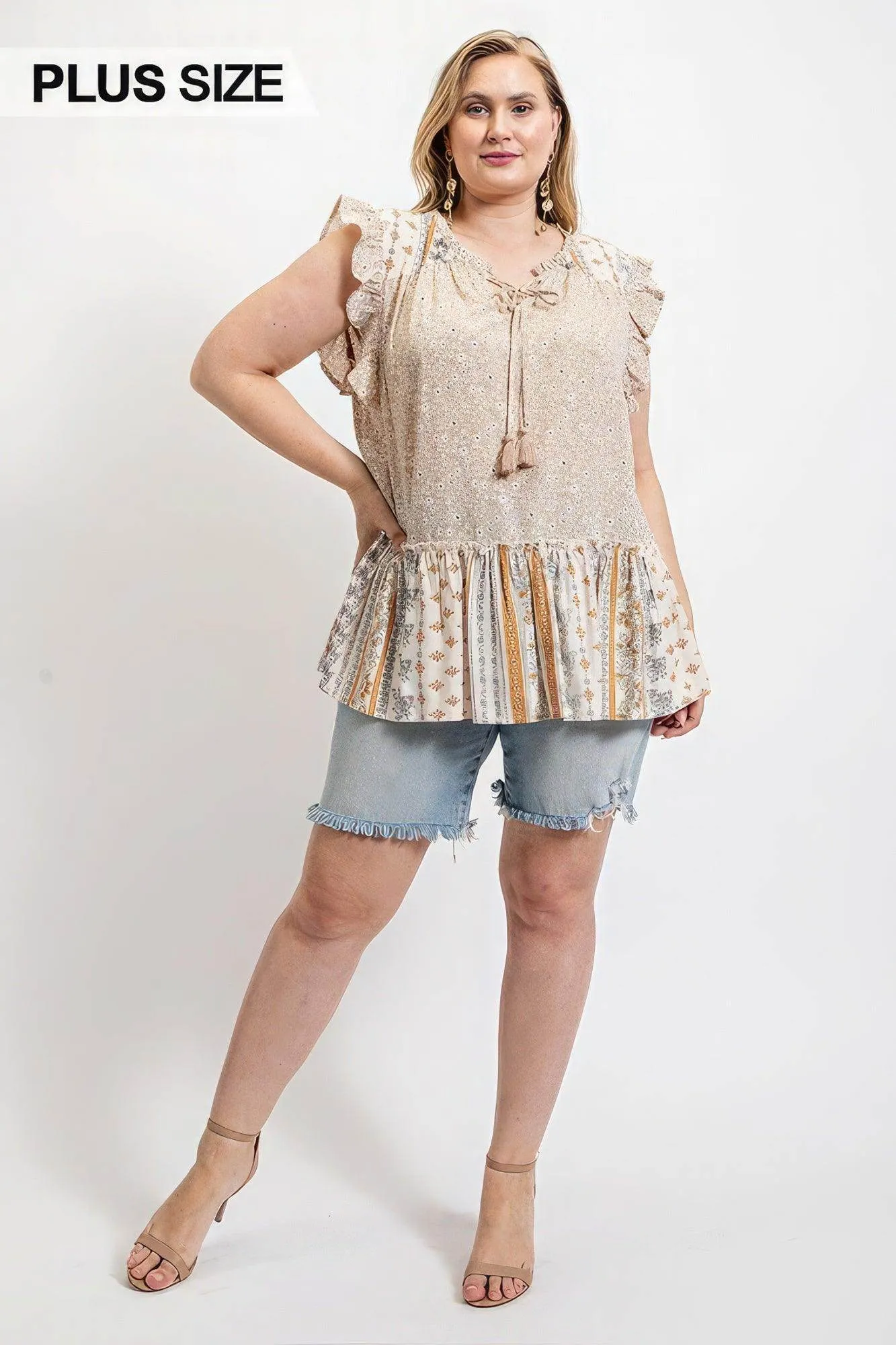Woven Prints Mixed and Sleeveless Flutter Top with Tassel
