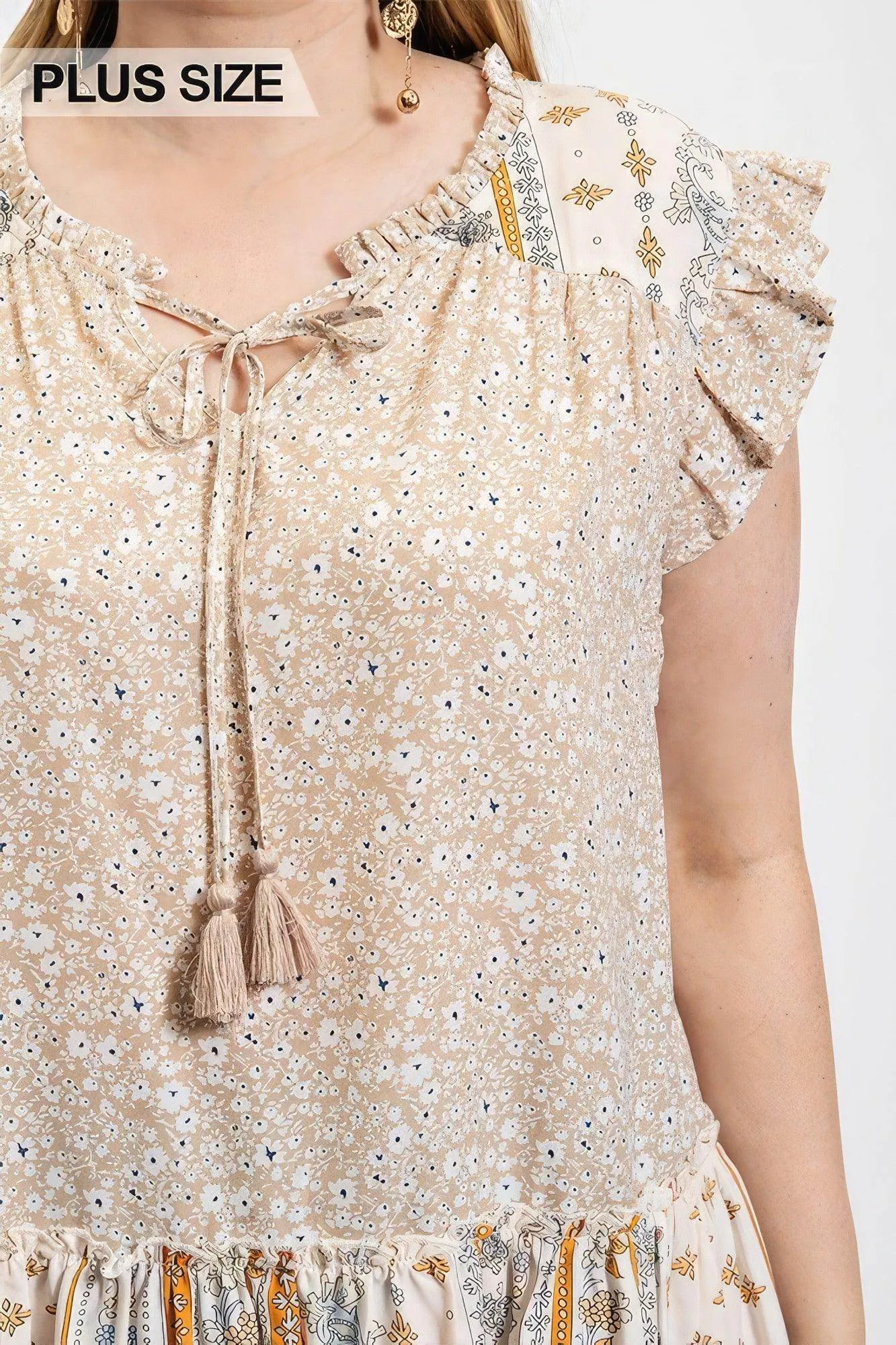 Woven Prints Mixed and Sleeveless Flutter Top with Tassel