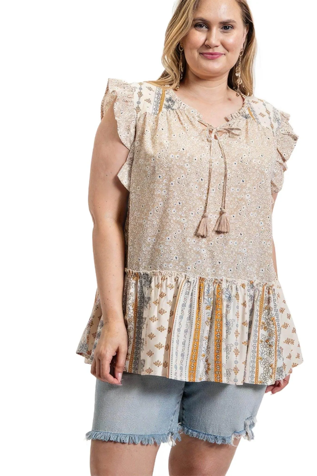 Woven Prints Mixed and Sleeveless Flutter Top with Tassel
